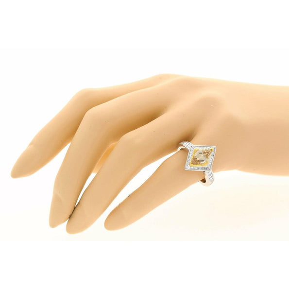 1 carat GIA certified Fancy Yellow Lozenge-cut Diamond Ring