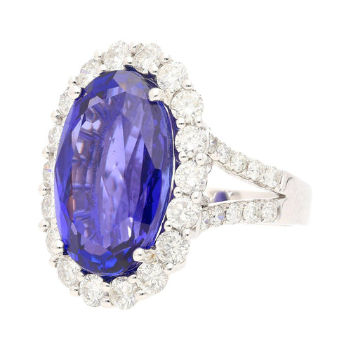 15.46 Carat Oval Cut Fine Tanzanite and Diamond Halo Ring in 18k White Gold With Split Shank Setting