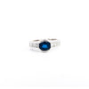 18K White Gold Bezel and Channel Set Oval Cut Blue Sapphire & Baguette Diamond Ring