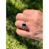 2.32 Carat Oval Cut Blue Sapphire with Trillion Cut Diamond Side stones in 18k Yellow Gold Ring