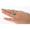 4.42 Carat TW Colombian Emerald with Round & Emerald Cut Diamond Halo Ring