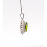 5.03 Carat Oval Cut Peridot Pendant with Round Cut Diamond Halo in 18K White Gold