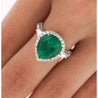 5.12 Carat Pear Cut Colombian Emerald Ring with Baguette Diamond Sides in 18K Gold