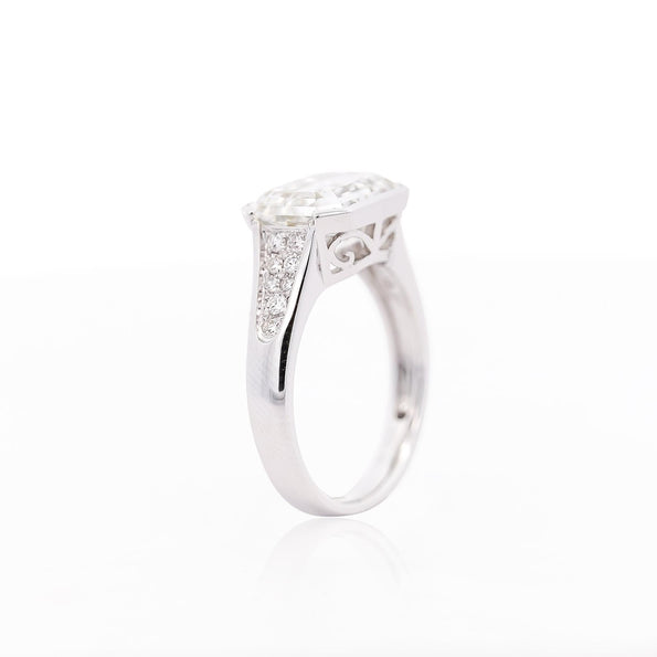 5.53 Carat Emerald Cut Lab Grown Diamond Half Bezel White Gold Ring