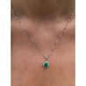 Cabochon Cut Emerald and Diamond pendant in 18k white gold floral/star design