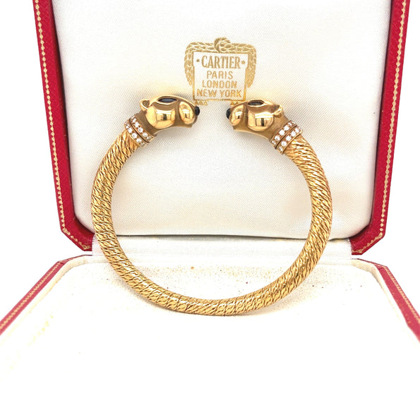 Signé Cartier, bracelet jonc Panthère à double tête en or 18 carats avec boîte et papiers d'origine