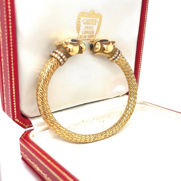 Cartier Bracelet rigide Panthère à double tête signé en or 18 carats avec boîte et papiers d'origine