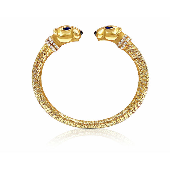 Signée Cartier, bracelet jonc Panthère à double tête en or 18 carats avec boîte et papiers d'origine