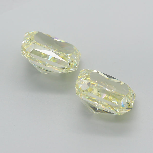 GIA Certified 10.52 Carat Fancy Light Yellow Radiant Cut Diamond Pair Loose