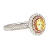 GIA Certified 1.01 Carat Round Cut Fancy Yellow Diamond Ring