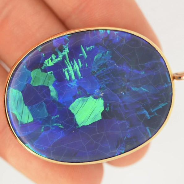 GIA Certified 35 Carat Marcus & Co Australian Black Opal in 18K Gold Pendant
