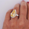 GIA Certified 6.06 Carat Fancy Intense Yellow Pear Cut Diamond 18K Ring