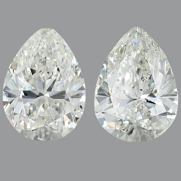 GIA Certified 6.76 Carat Pear Cut Diamond Stud Earrings