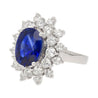 GRS Certified 5.79 Carat Oval Royal Blue Sapphire and Diamond Halo Ring