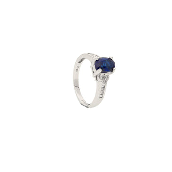 Oval cut Natural Blue Sapphire with natural baguette cut diamonds in 18k solid white gold – Assay Jewelers