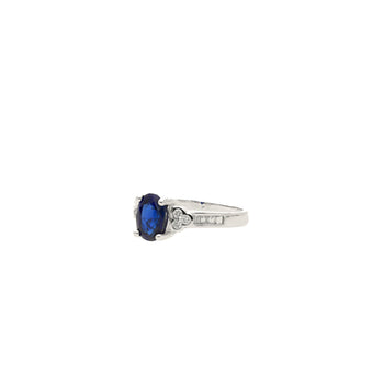 Oval cut Natural Blue Sapphire with natural baguette cut diamonds in 18k solid white gold – Assay Jewelers