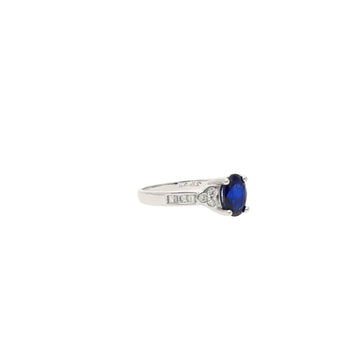 Oval cut Natural Blue Sapphire with natural baguette cut diamonds in 18k solid white gold – Assay Jewelers