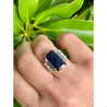 Vintage 8.56 carat Vivid Blue Sapphire and Trapezoid Diamond Ring in Platinum